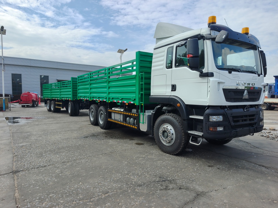 Kendaraan derun Howo TX400 Truk dan Trailer Dikirim ke Ethiopia